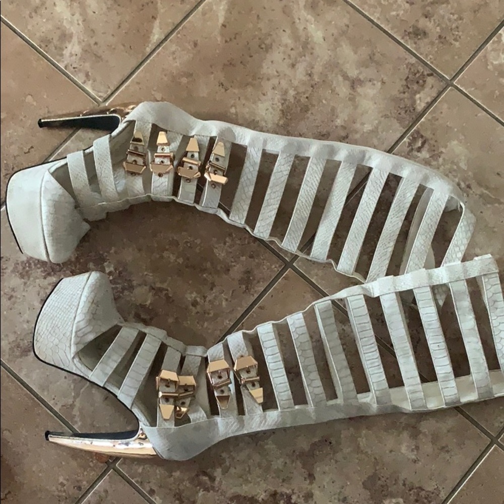 White and gold platform boots